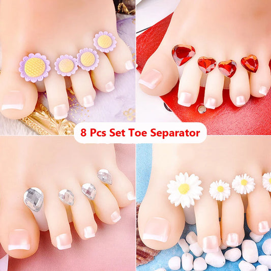 8-piece set of decorative toe separators featuring flower, heart, daisy, and gem designs on toes for pedicures