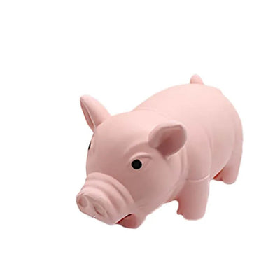 Pink pig-shaped squeaky dog toy made of soft rubber, ideal for chewing and interactive pet play