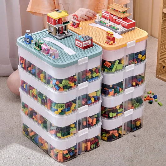 Stackable transparent Lego-compatible storage boxes with colorful building blocks and playable lids, ideal for toy organization and display