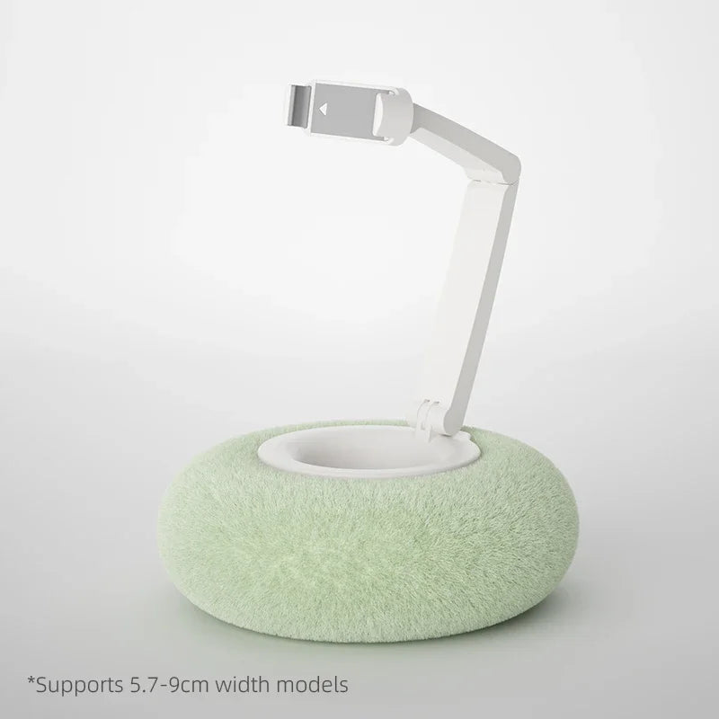 Flexible phone stand with green plush cushion base – supports devices 5.7–9cm wide, ergonomic hands-free holder by BeTrendy