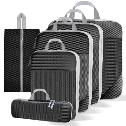 Black mesh compression packing cubes set with five pieces including a shoe bag and accessory pouch, featuring gray handles and zippers for organized travel
