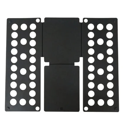 Flat view of black plastic clothes folding board with perforated panels for easy and fast garment folding