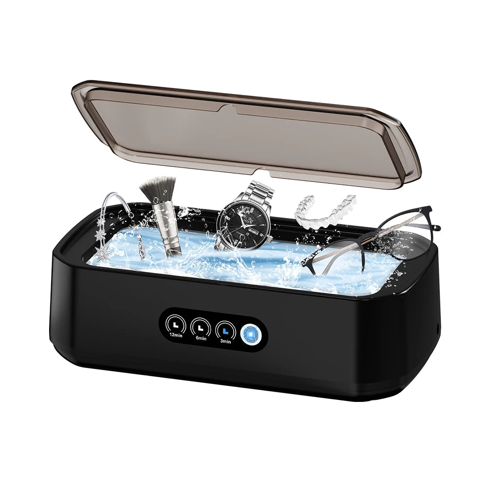 Black ultrasonic cleaner with open lid and water splashing, cleaning eyeglasses, jewelry, watch, makeup brush, and dental retainer