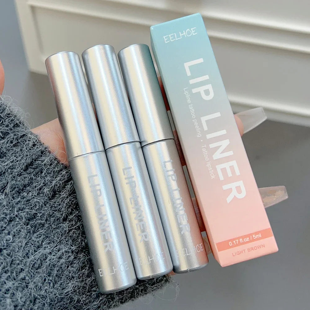 Three EELHOE lip liner tubes in silver packaging held in hand next to product box labeled light brown shade Betrendy