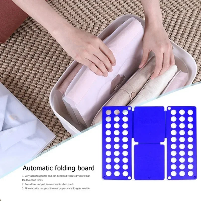 Hands placing neatly folded clothes into a storage bin using an automatic folding board, showcasing organized drawer setup