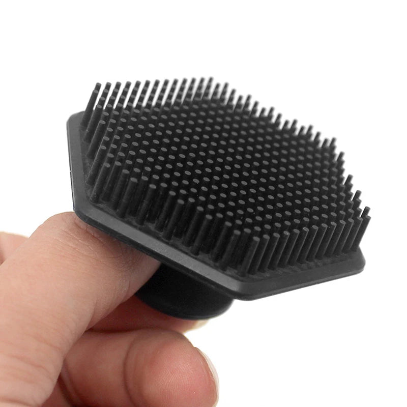 Close-up of hexagon-shaped silicone facial cleansing brush with soft bristles.  BeTrendy