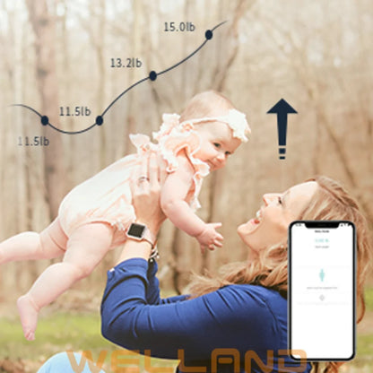 Mother lifting baby while tracking weight history using the Icomon smart scale mobile app

