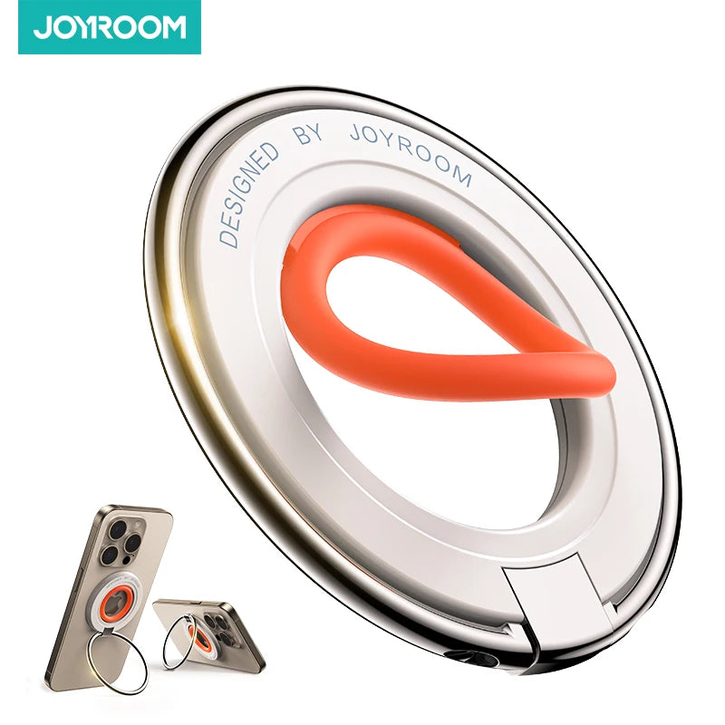Joyroom magnetic phone ring holder with soft orange silicone grip and silver metal frame, shown attached to iPhone as a stand and finger grip