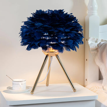 Nordic blue feather table lamp with soft LED light on white nightstand