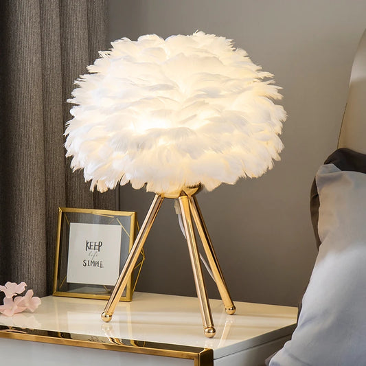 Elegant Nordic goose feather table lamp with soft LED glow on bedside nightstand