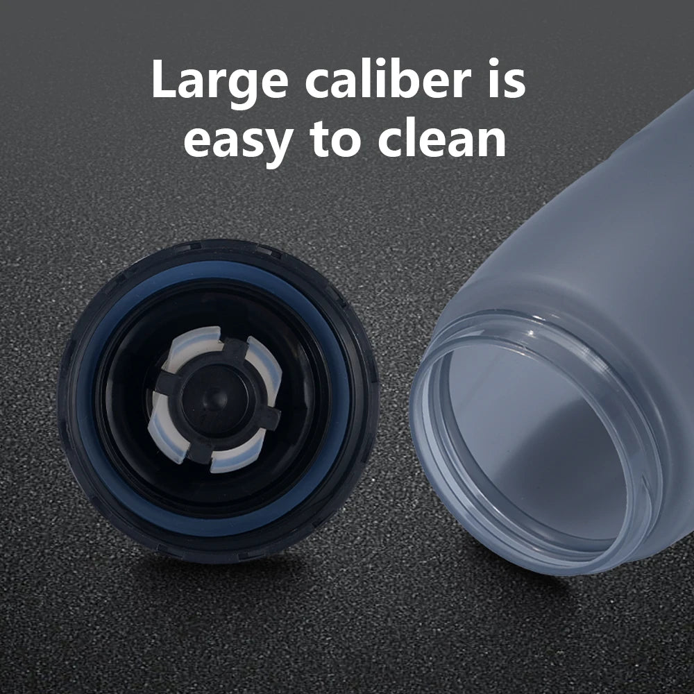 Open Rapha cycling water bottle with wide-mouth design and removable leakproof cap shown separately on a black surface for easy cleaning