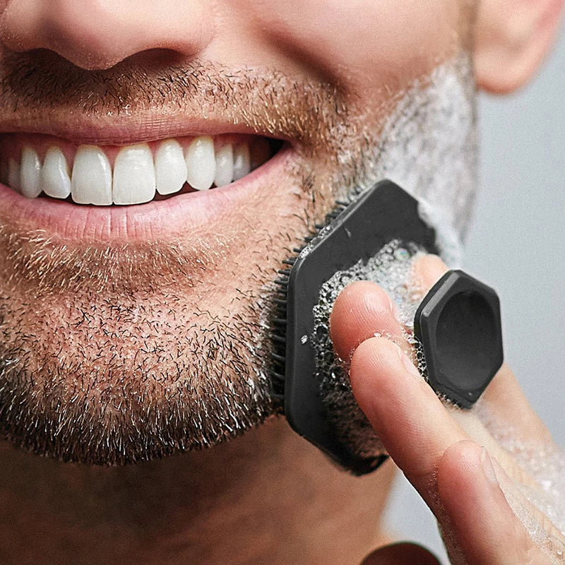 Man using silicone beard cleansing brush for facial grooming and exfoliation"