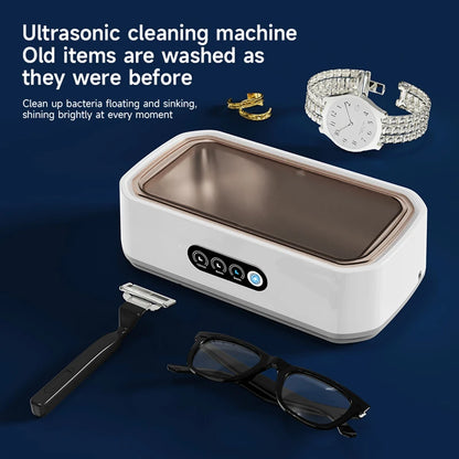 Ultrasonic cleaning machine cleaning watch, gold rings, eyeglasses, and razor with digital touch controls on a blue background