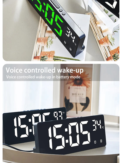 Voice-controlled LED digital alarm clock with time and temperature display in black casing, shown on a desk with daylight background beTrendy