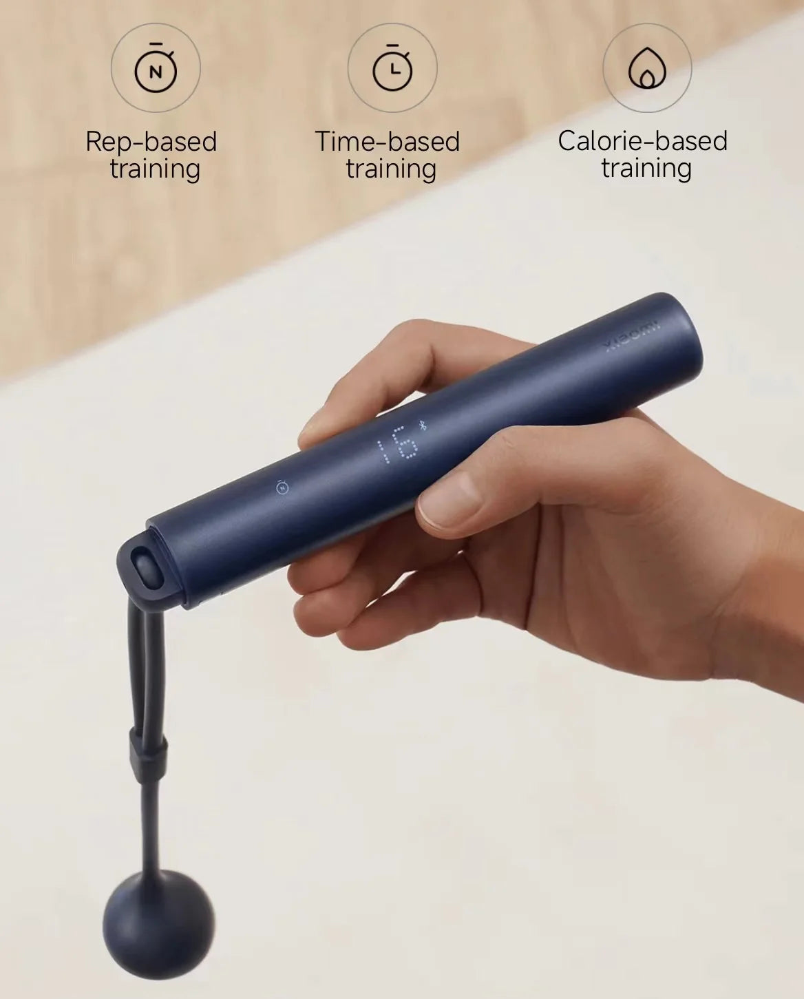 Handheld Xiaomi jump rope showing interval, time-based, and calorie-focused training options